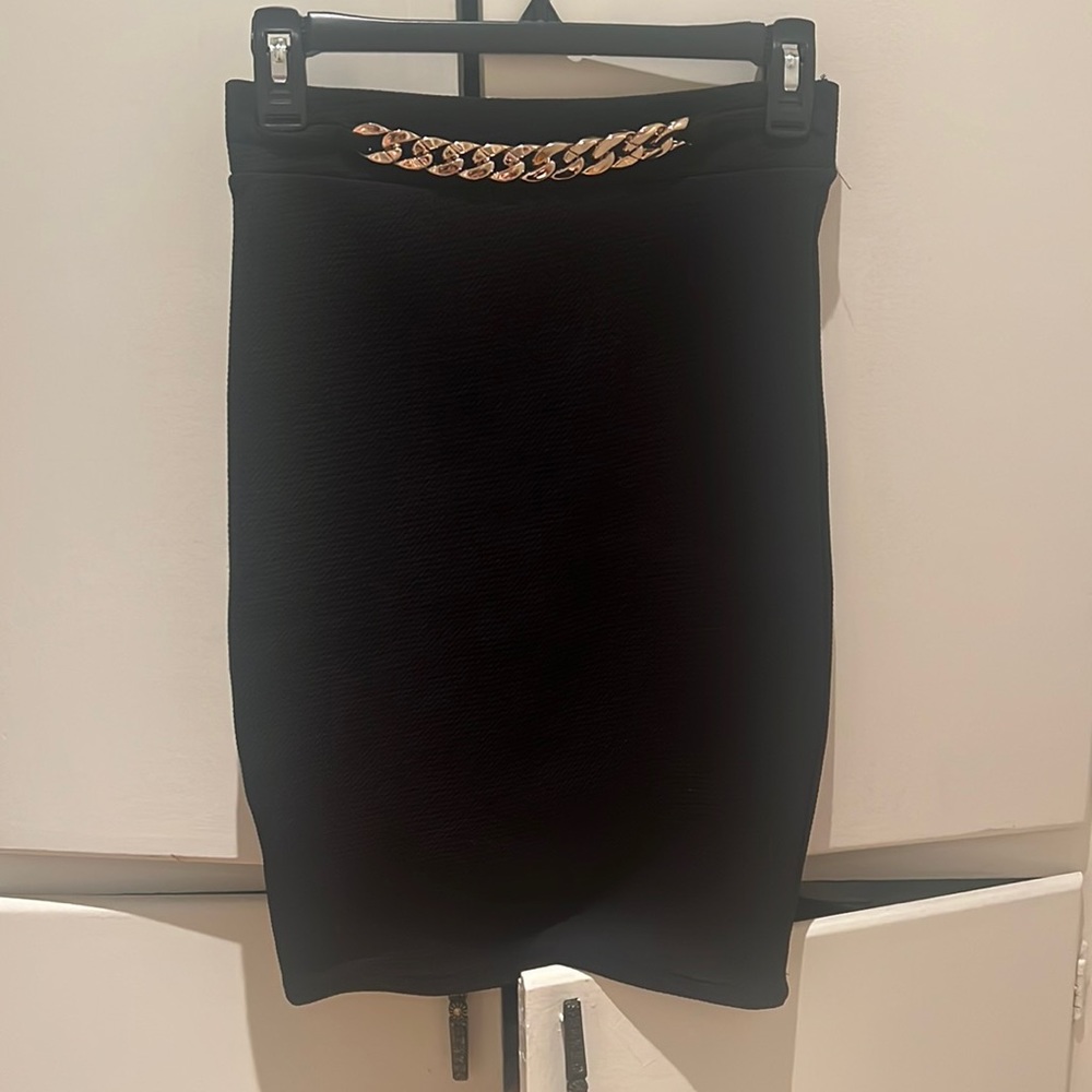 Black skirt with gold belt design